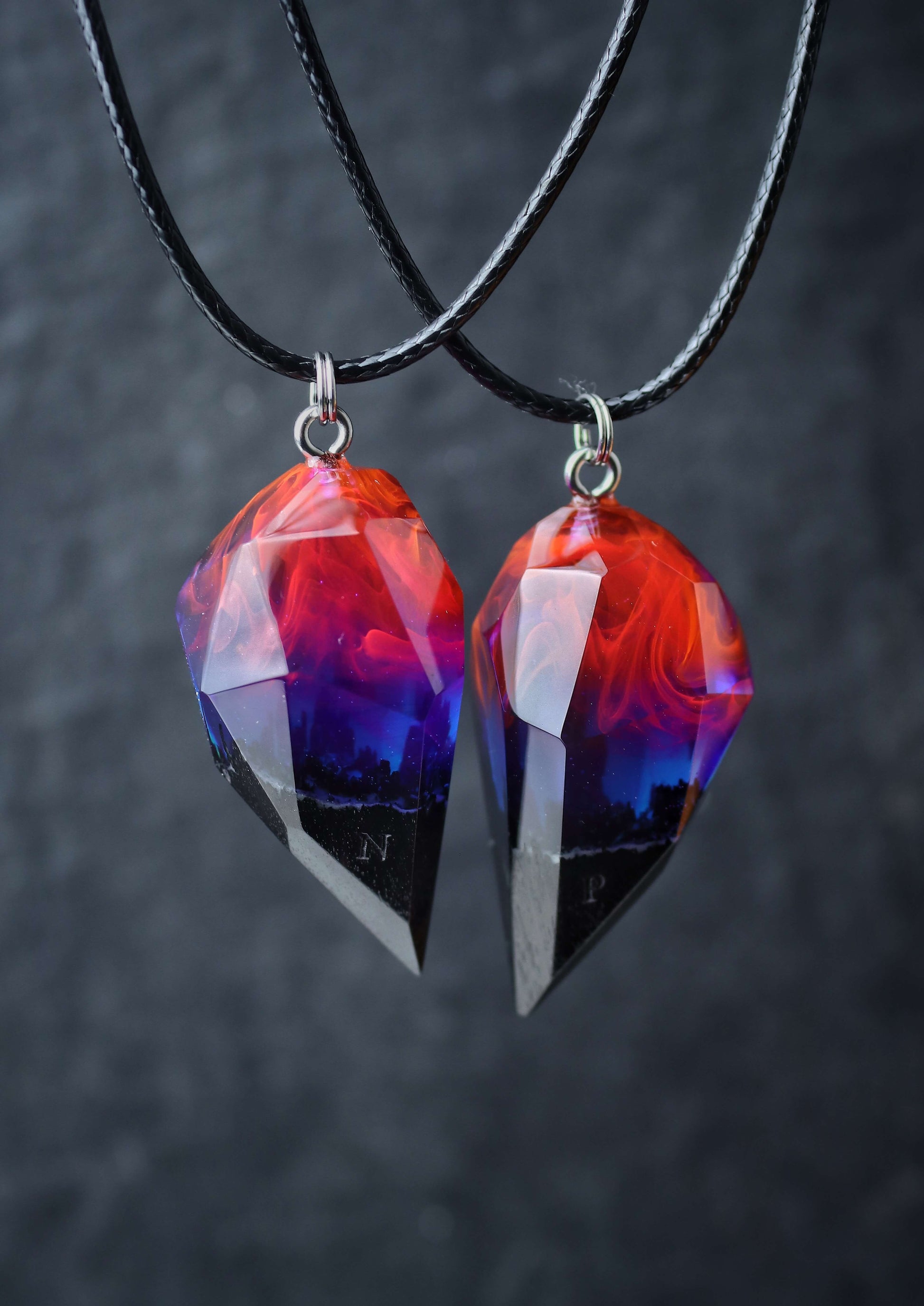 Couple crystal pendants handmade from resin and wood with fire effect