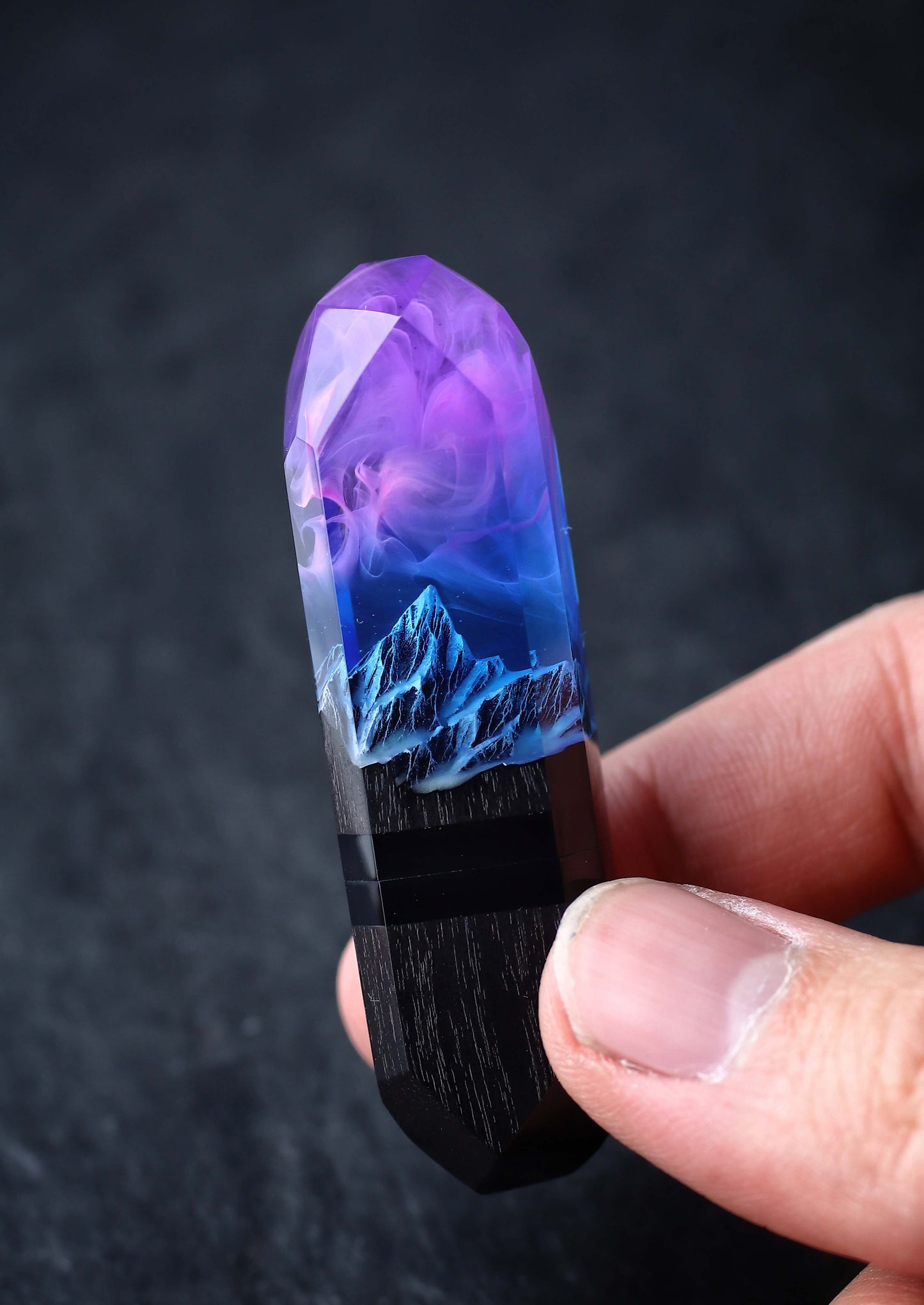 Handmade resin and wood USB stick with mountain design held in hand