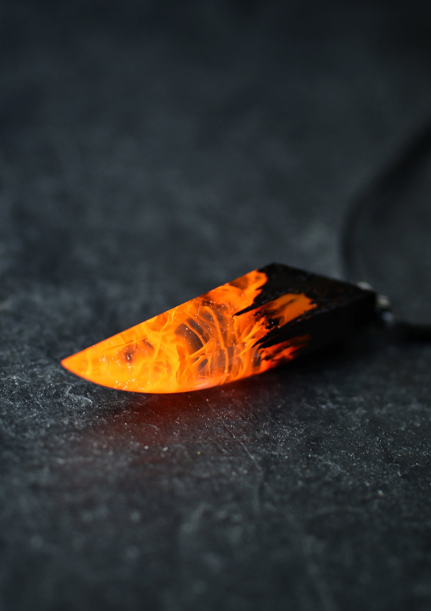 Epoxy resin and wood Fire Fang pendant