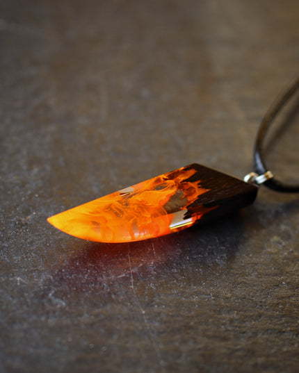 Epoxy resin and wood Fire Fang pendant