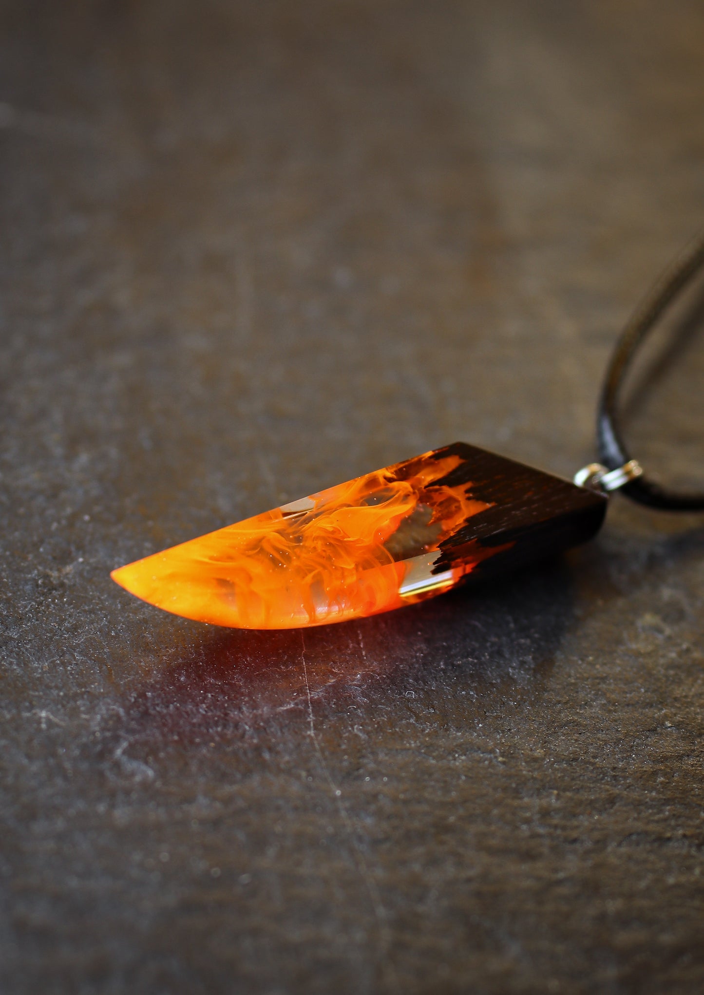 Epoxy resin and wood Fire Fang pendant