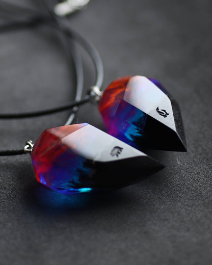 Couple crystal pendants handmade from resin and wood with Nightfall effect