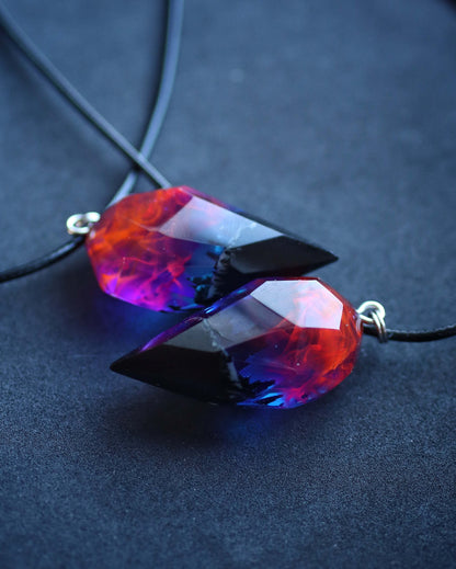 Couple crystal pendants handmade from resin and wood with Nightfall effect