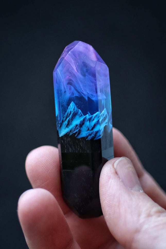 Handmade resin and wood USB stick with mountain design held in hand