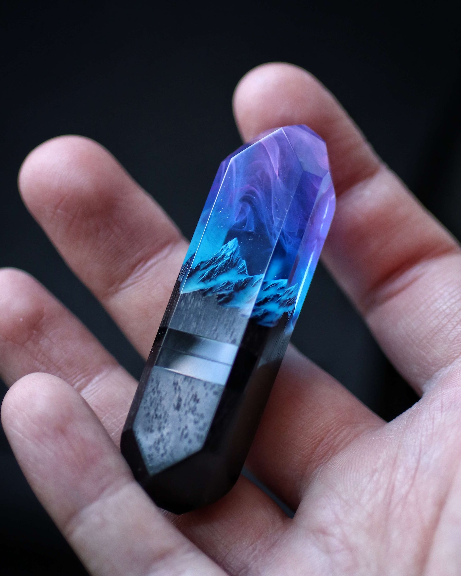 Handmade resin and wood USB stick with mountain design held in hand”