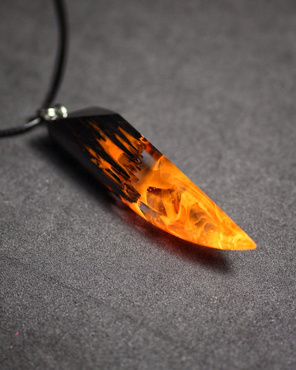 Epoxy resin and wood Fire Fang pendant