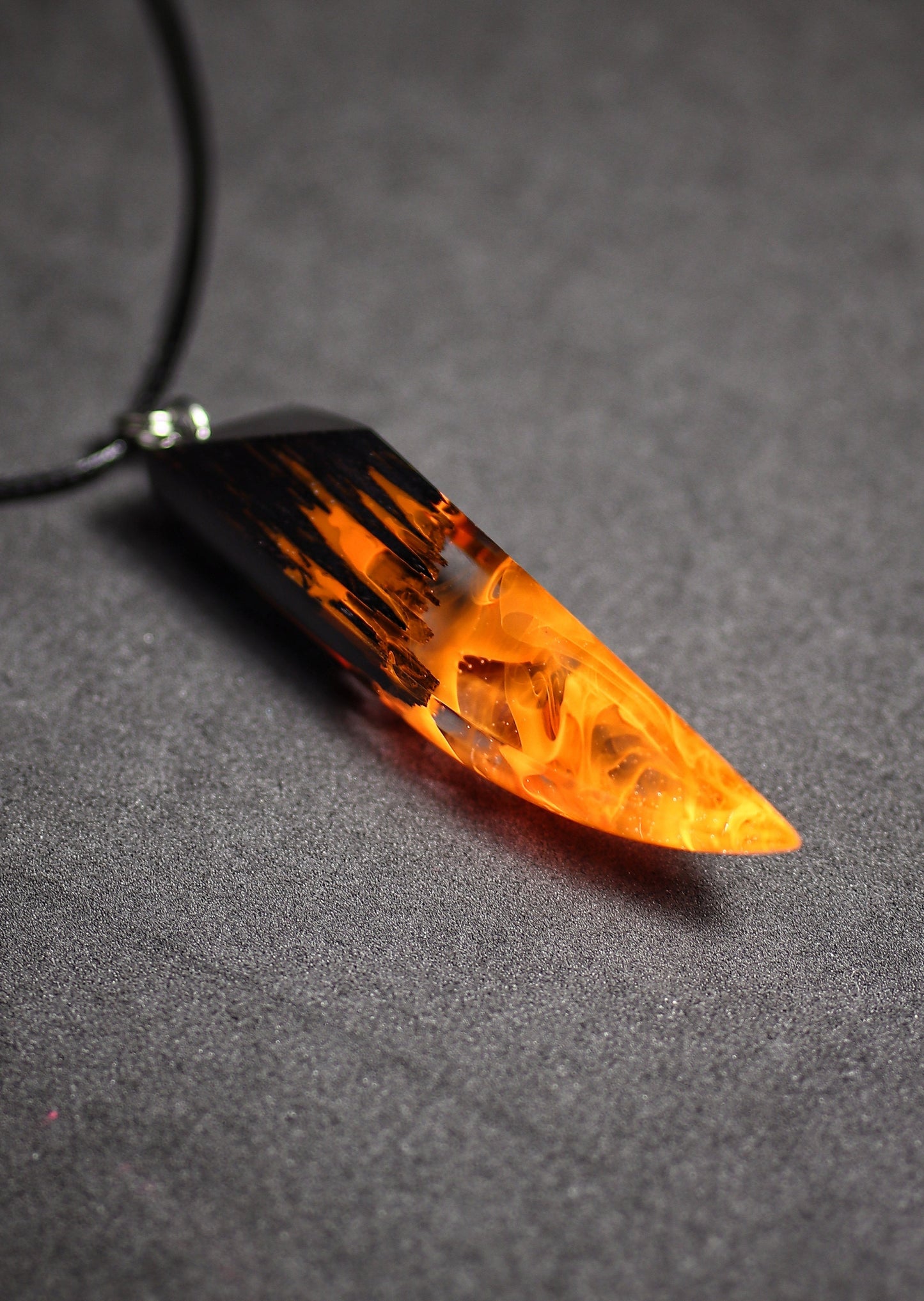 Epoxy resin and wood Fire Fang pendant