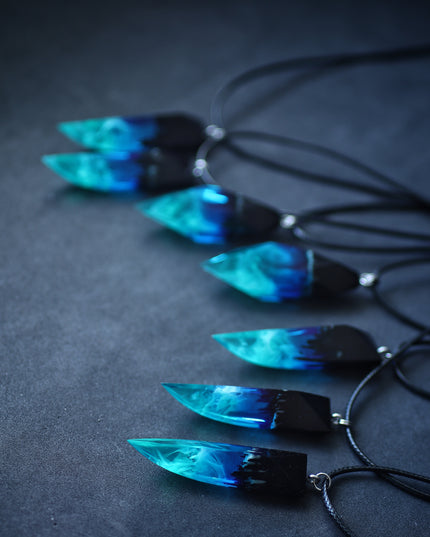 Epoxy resin and wood Northern lights Fang pendant