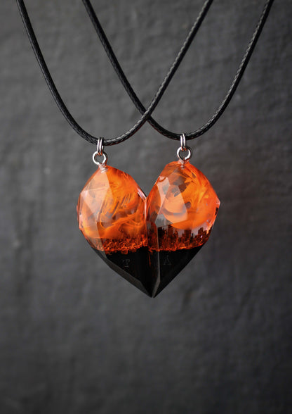 Pair of resin and wood crystal couple pendants with fiery glow