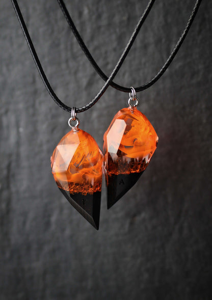 Pair of resin and wood crystal couple pendants with fiery glow