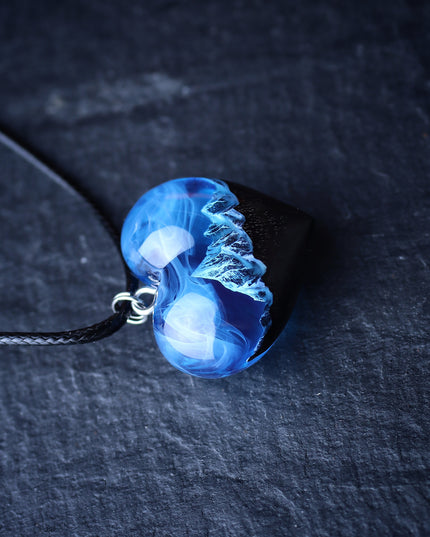 Epoxy resin and wood Mountain Heart Blue pendant