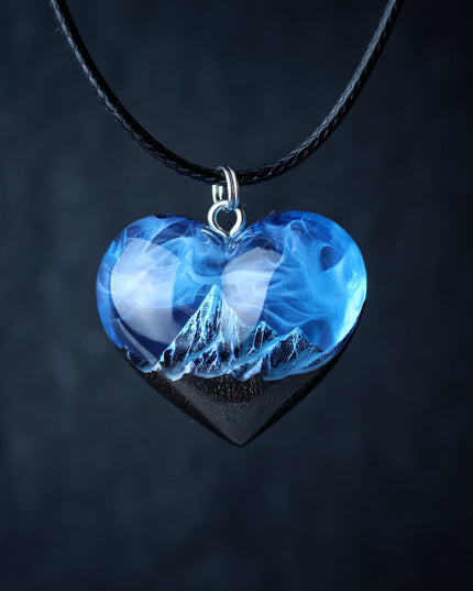 Epoxy resin and wood Mountain Heart Blue pendant
