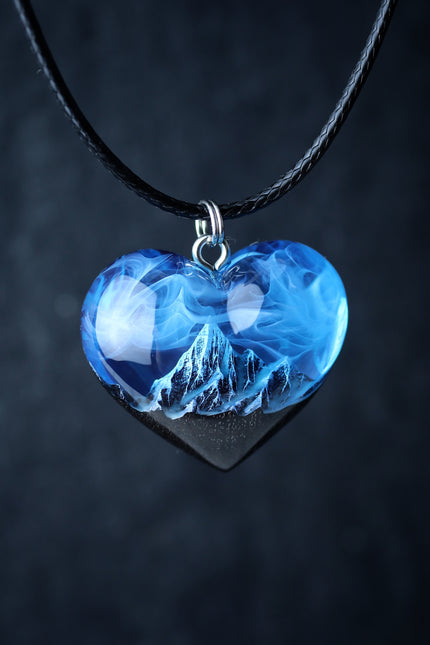 Epoxy resin and wood Mountain Heart Blue pendant