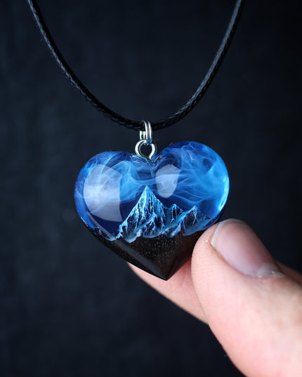 Epoxy resin and wood Mountain Heart Blue pendant