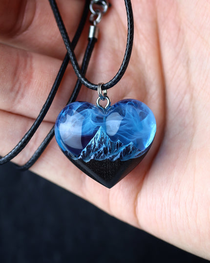 Epoxy resin and wood Mountain Heart Blue pendant