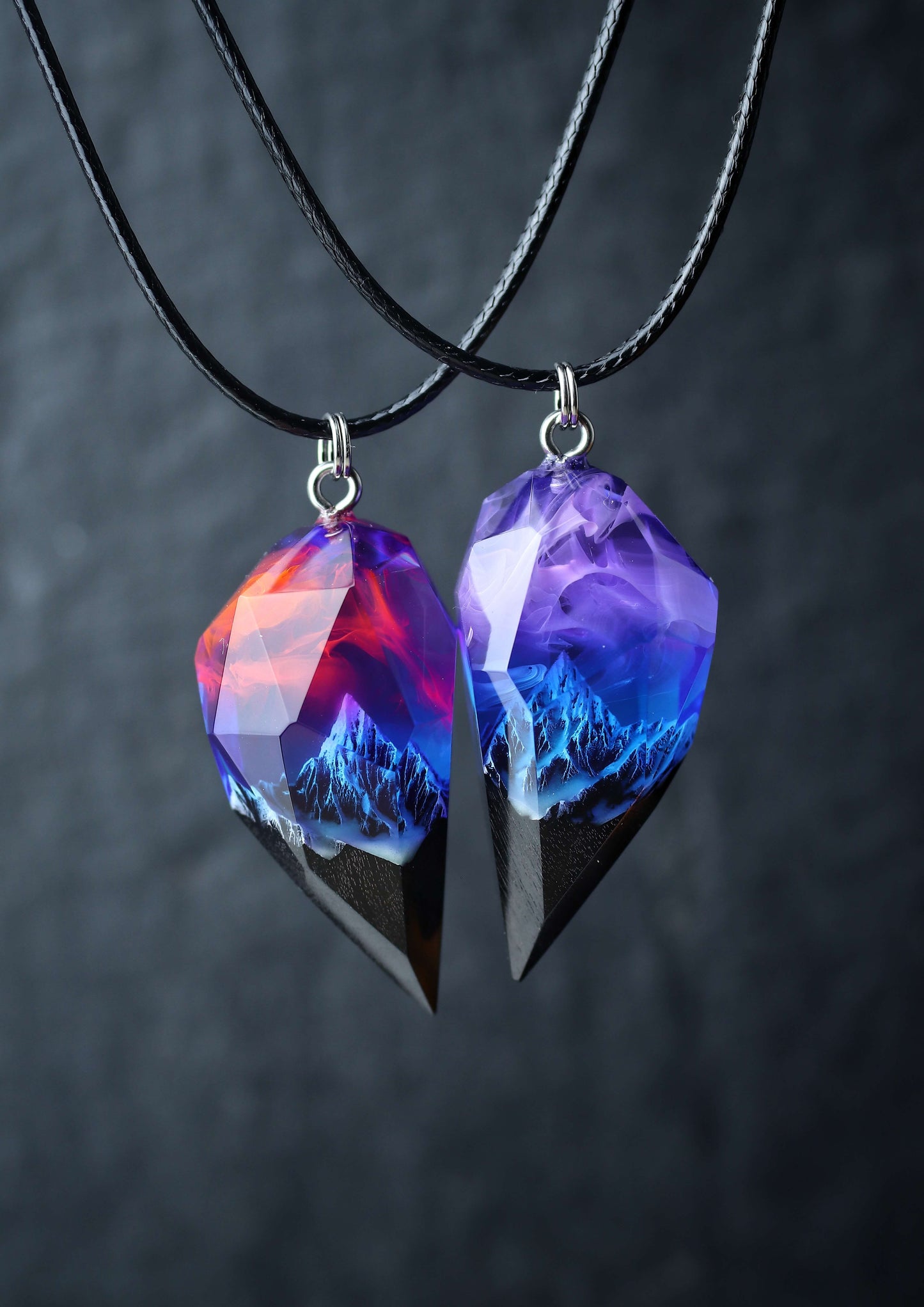 Pair of resin and wood crystal pendants with galaxy sky and mountains