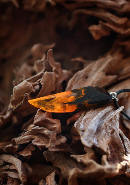 Epoxy resin and wood Fire Fang pendant