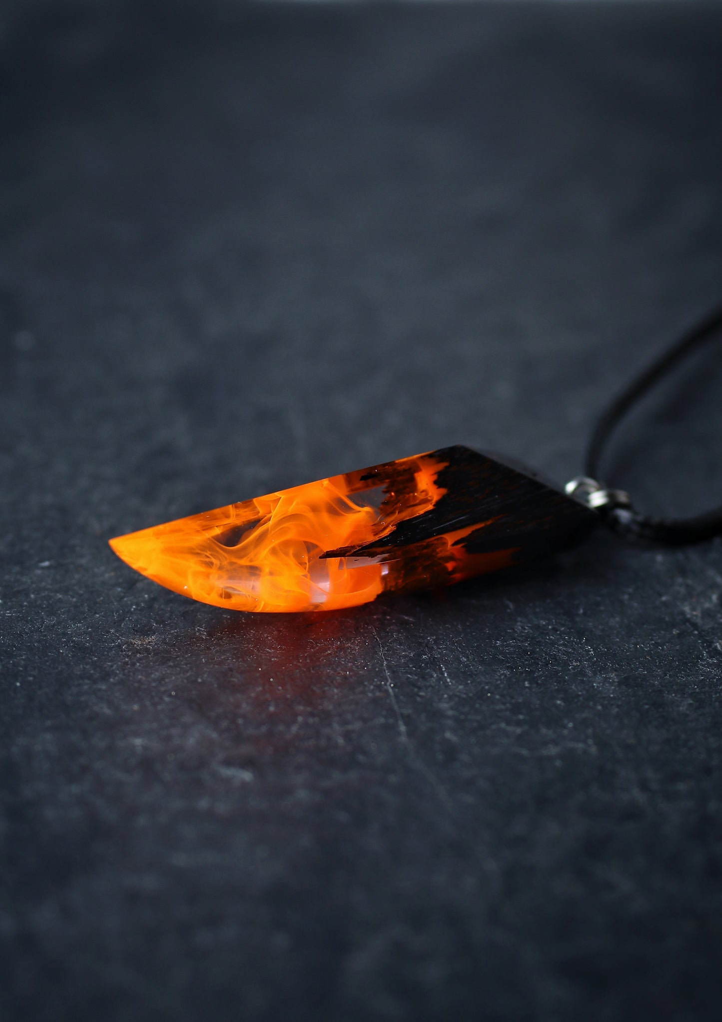 Epoxy resin and wood Fire Fang pendant