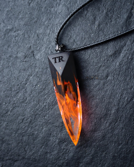Epoxy resin and wood Fire Fang pendant