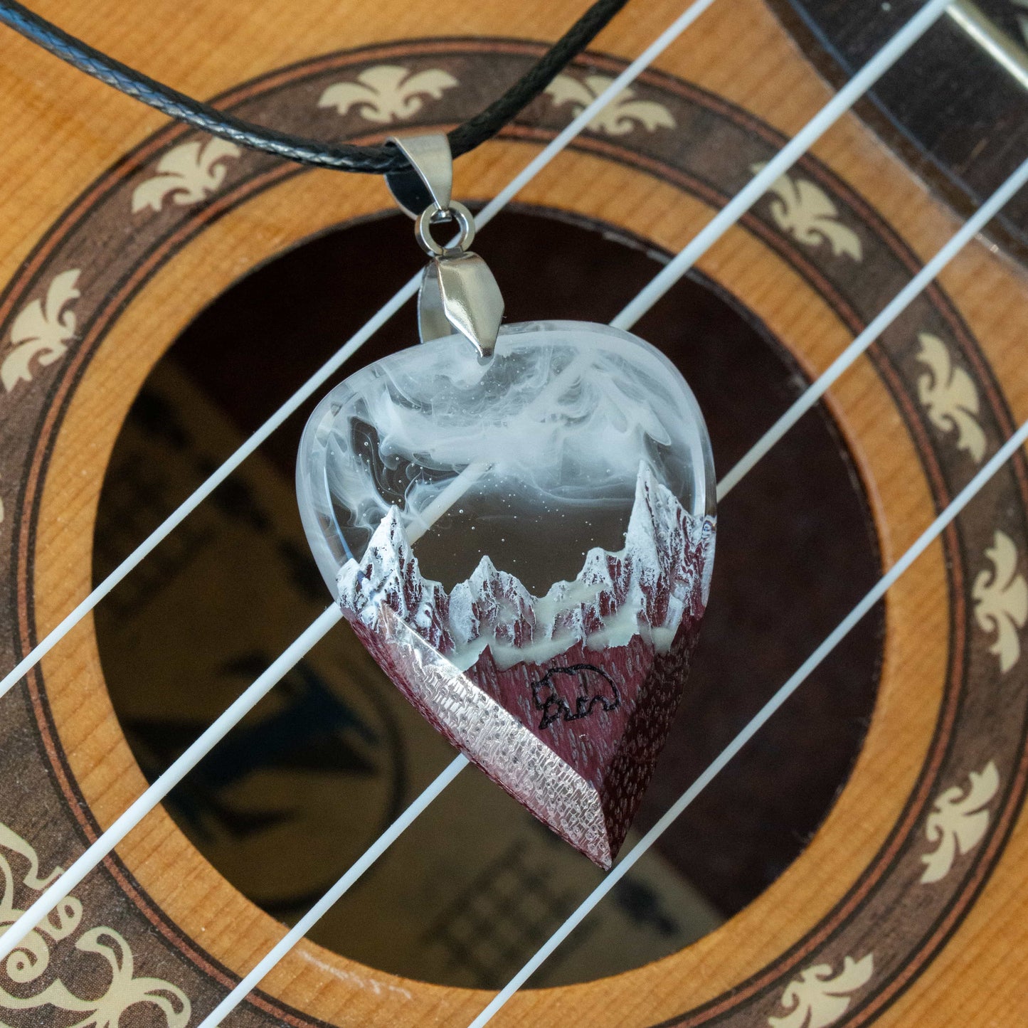 Amaranth Mountain guitar pick