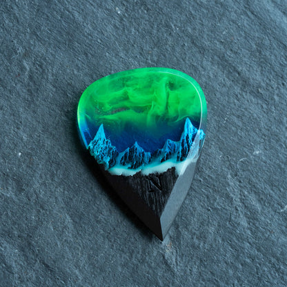 Emerald Aurora Mountain guitar pick
