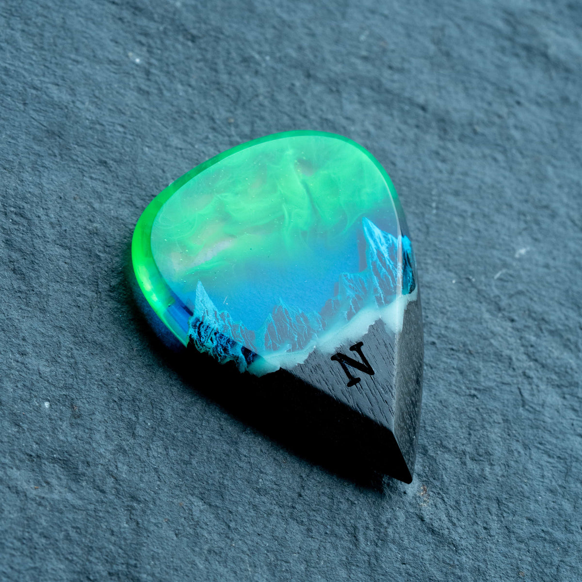 Emerald Aurora Mountain guitar pick