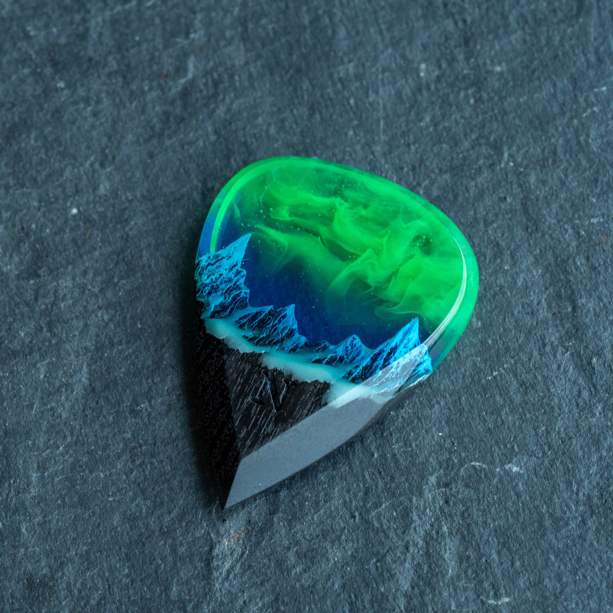 Emerald Aurora Mountain guitar pick