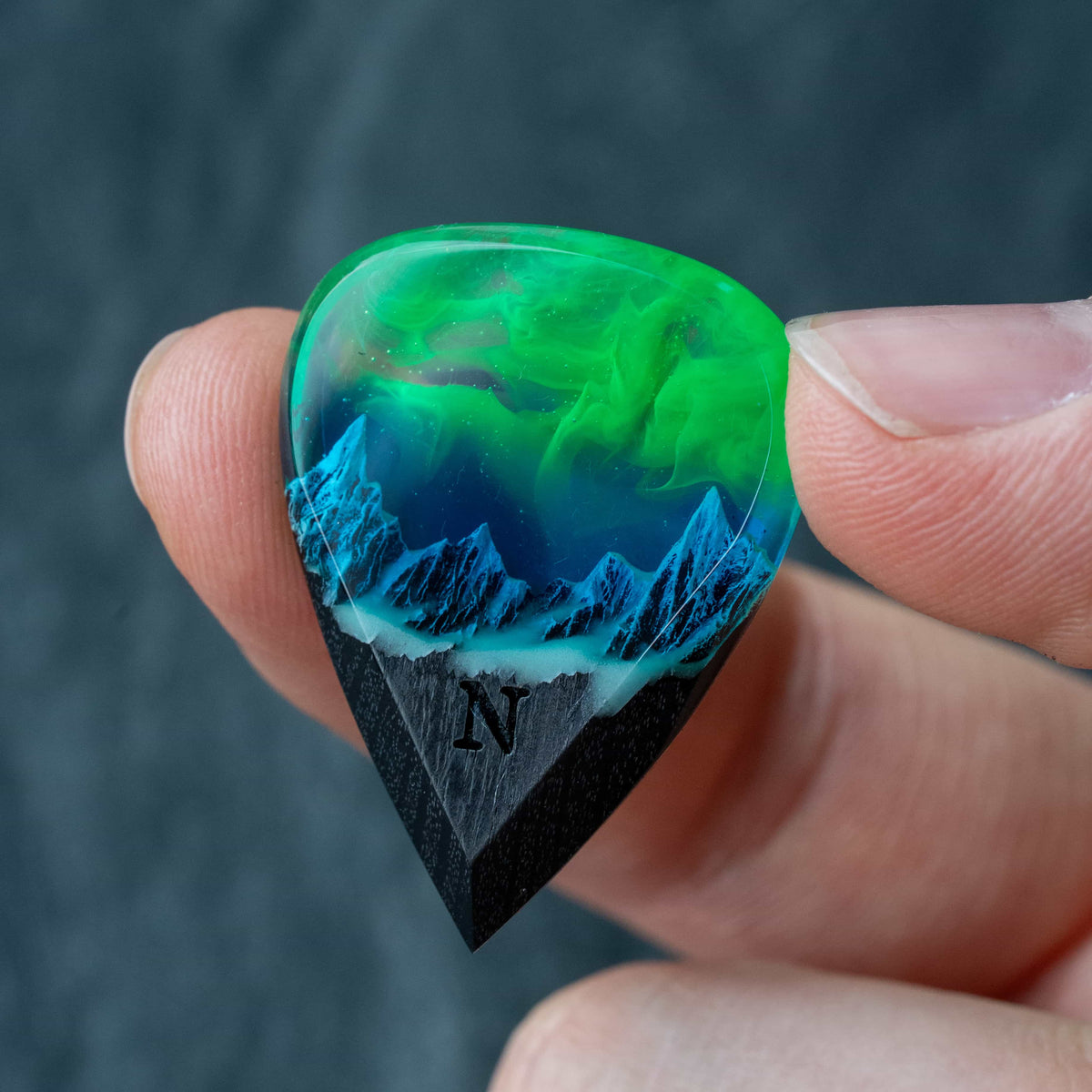 Emerald Aurora Mountain guitar pick
