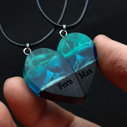 Matching couple heart necklace set of two halves, handmade wood resin pendants with northern lights over mountains and infinity engraving