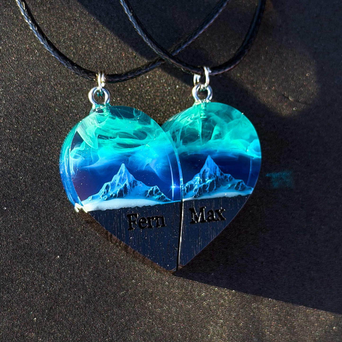 Matching couple heart necklace set of two halves, handmade wood resin pendants with northern lights over mountains and infinity engraving