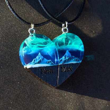 Matching couple heart necklace set of two halves, handmade wood resin pendants with northern lights over mountains and infinity engraving