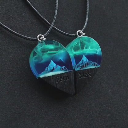 Matching couple heart necklace set of two halves, handmade wood resin pendants with northern lights over mountains and infinity engraving
